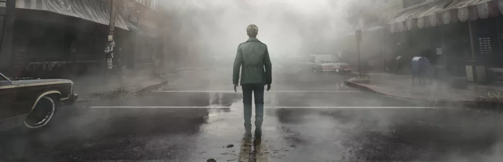 Capa de Silent Hill 2 com personagem andando no meio da rua com névoa.