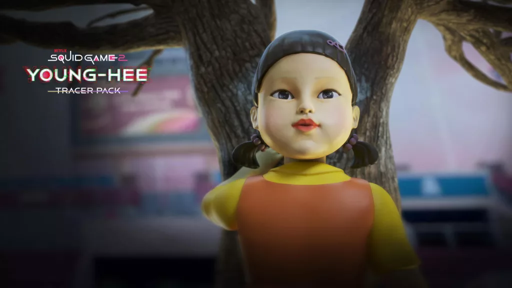 Young-Hee, a boneca com a mão na árvore e a cabeça ao contrário do corpo olhando para trás.