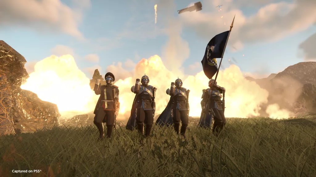 4 soldados, 1 deles de comandante e outro com a bandeira em Helldivers 2.