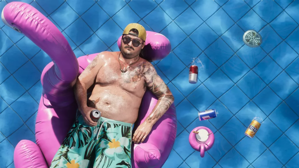 Cal em uma boa de flamingo rosa em uma piscina.