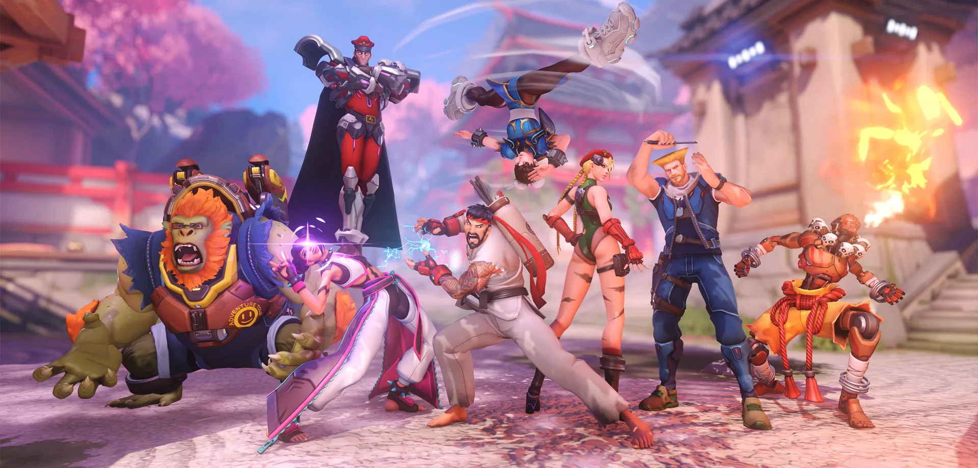 Imagem de personagens de Overwatch 2 com skins de Street Fighter 6 em uma imagem dentro do jogo.