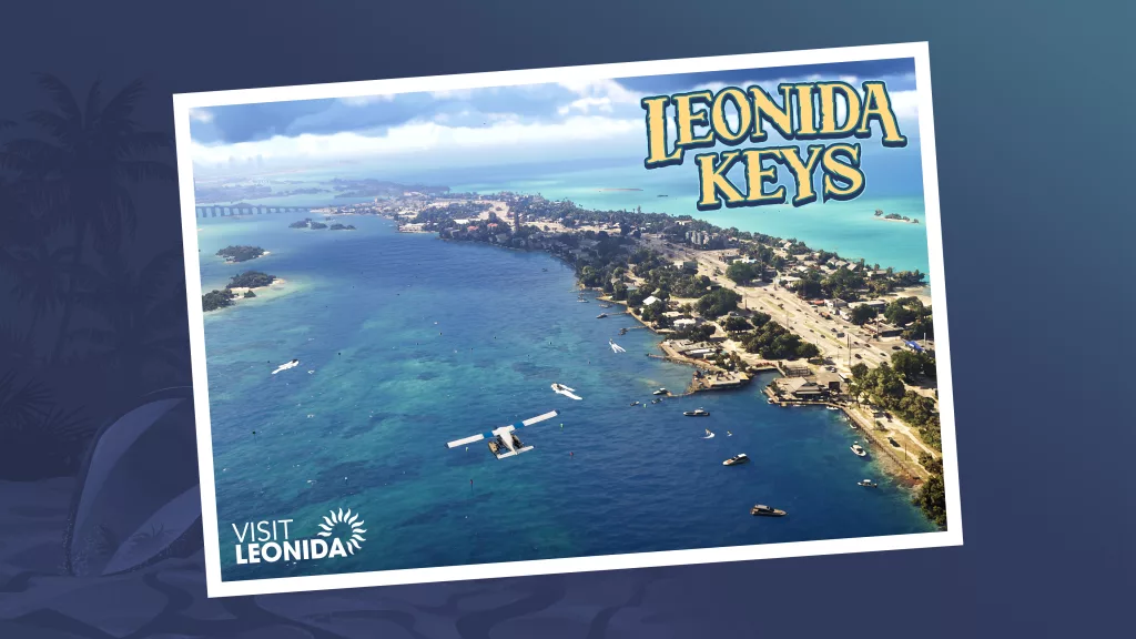 uma ilha comprida em meio ao grande mar e um avião passando por cima.
