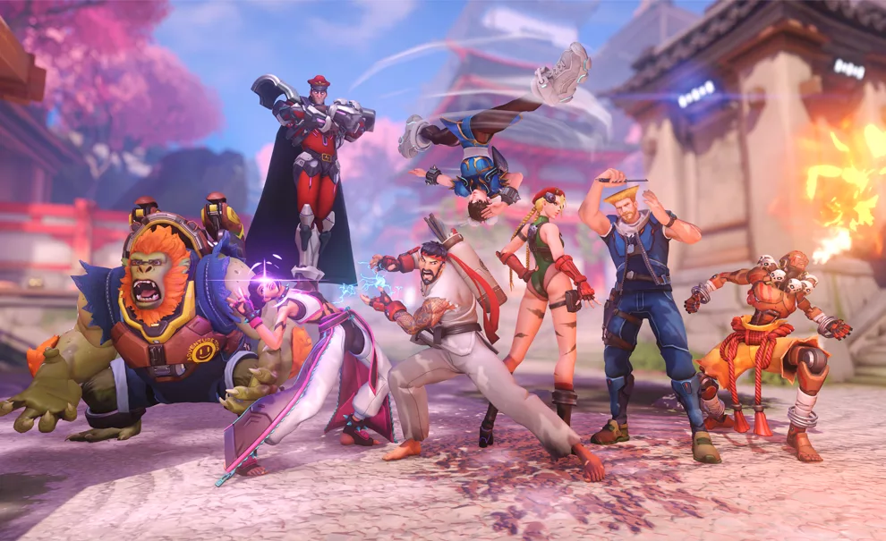 Imagem de personagens de Overwatch 2 com skins de Street Fighter 6 em uma imagem dentro do jogo.