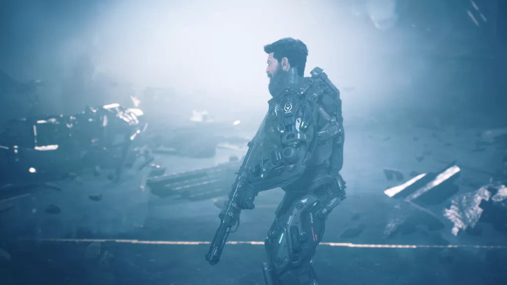 Personagem com exoesqueleto olhando para destroços em La Quimera.