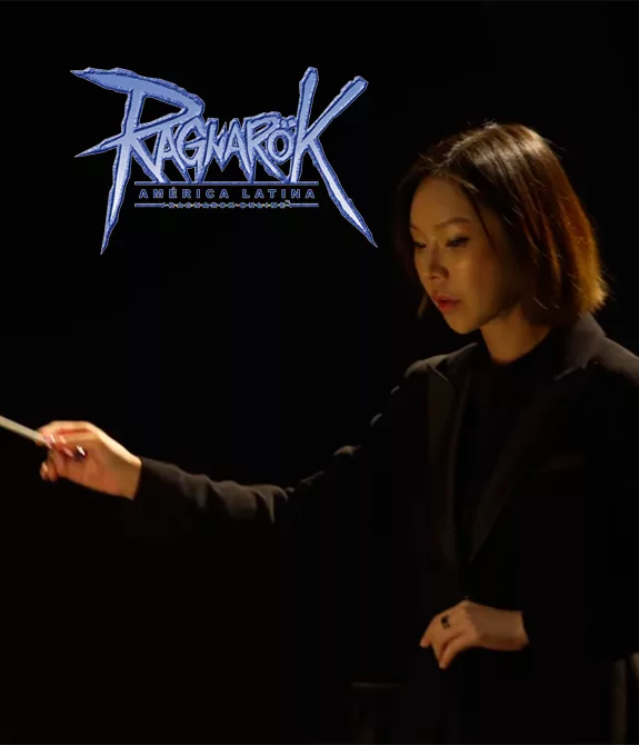 Maestra Sol Chin regendo a Orquestra Sinfônica Villa Lobos em apresentação das músicas de Ragnarök Online.