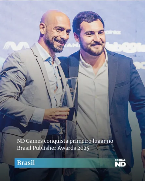 Duas pessoas em foto, uma dela é Ivan, Head do ND Games e está com um troféu em mãos.