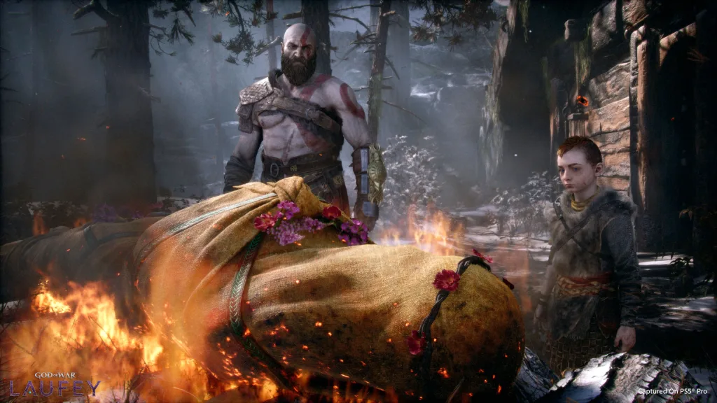 Kratos e Atreus queimando o corpo de Faye no Funeral.